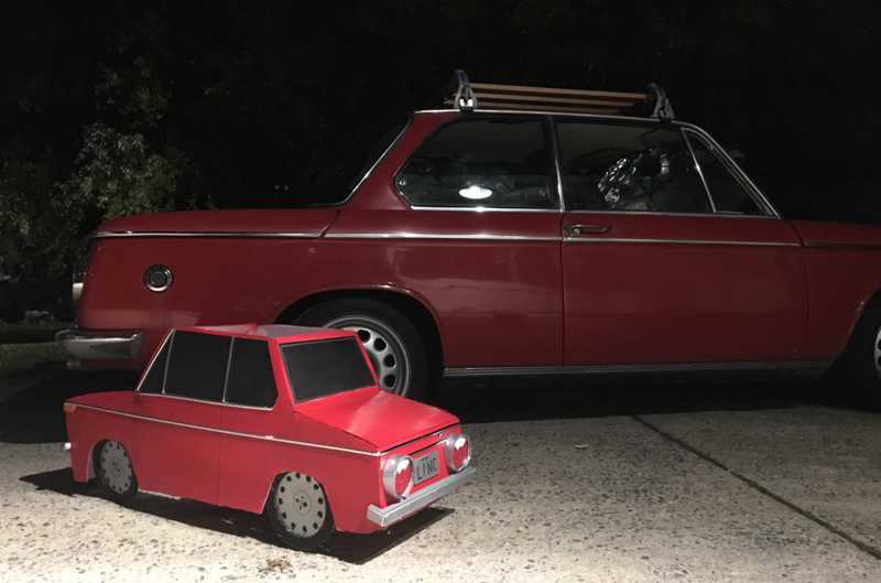 Illustration for article titled Dad Wins Car-Halloween With This Fantastic BMW Costume For His Kid